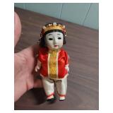 Traditional Japanese Gofun Doll in Festival Attire