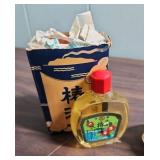 Miscellaneous Vintage items from Japan including 2 bottles of Oshima Tsubaki Camellia Oil, 2 lava rocks, plastic oyster scene, and more