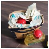 Miscellaneous Vintage items from Japan including 2 bottles of Oshima Tsubaki Camellia Oil, 2 lava rocks, plastic oyster scene, and more