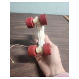 Antique Pull-Along Lamb Toy with Red Wheels