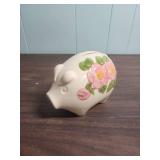 Large Terracotta Pig Bank and White Ceramic Piggy Bank with floral motif