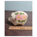 Large Terracotta Pig Bank and White Ceramic Piggy Bank with floral motif
