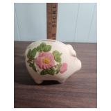 Large Terracotta Pig Bank and White Ceramic Piggy Bank with floral motif