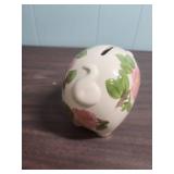 Large Terracotta Pig Bank and White Ceramic Piggy Bank with floral motif
