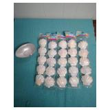 White Plastic Shell-Shaped Easter Egg Containers and a large plastic easter egg