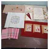 Handcrafted Family Quilt Blocks, Embroidered projects, and a set of pink plaid napkins