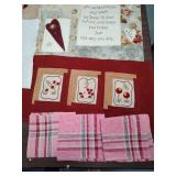 Handcrafted Family Quilt Blocks, Embroidered projects, and a set of pink plaid napkins