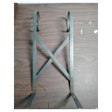 Metal support - looks like it is meant to have a Christmas Sleigh of some sort on it.  Add your own to it!