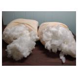Two bags of poly-fill pillow stuffing