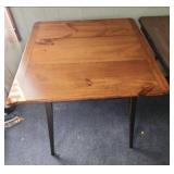 Wood square bistro table with black antiqued paint finished legs and wood top. 29"W x 29.25"D x 29"H - good condition. A couple very small scratches on the top.