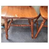 Two vintage solid Maple dining chairs with Spindle backs and turned legs. 18"W x 16.5" D x 38"H. Seat height 17".  Very good condition. Slight finish wear on top spindles of one chair