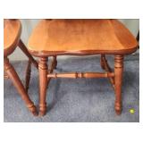 Two vintage solid Maple dining chairs with Spindle backs and turned legs. 18"W x 16.5" D x 38"H. Seat height 17".  Very good condition. Slight finish wear on top spindles of one chair
