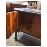Vintage Wooden Magazine Rack Side Table with Turned Legs and side storage compartment  12.5"W x 24"D x 22.25"H - heavy finish wear and chipped laminate along front edge
