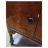 Vintage Wooden Magazine Rack Side Table with Turned Legs and side storage compartment  12.5"W x 24"D x 22.25"H - heavy finish wear and chipped laminate along front edge