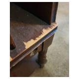 Vintage Wooden Magazine Rack Side Table with Turned Legs and side storage compartment  12.5"W x 24"D x 22.25"H - heavy finish wear and chipped laminate along front edge