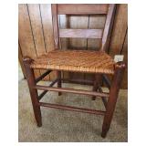 Vintage Wooden Ladder Back Chair with Woven Rotan Seat. Sturdy, good condition. 17.5"W x 13.5"D x 33.5"H. Seat height 17"