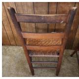 Vintage Wooden Ladder Back Chair with Woven Rotan Seat. Sturdy, good condition. 17.5"W x 13.5"D x 33.5"H. Seat height 17"