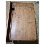 Antique American School Desk with Cast Iron Base and folding front chair. 22"W x 28"D x 30"H. Seat height 15". Desk height 26". Has finish wear and markings on the wood.