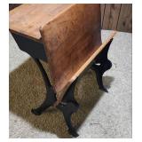 Antique American School Desk with Cast Iron Base and folding front chair. 22"W x 28"D x 30"H. Seat height 15". Desk height 26". Has finish wear and markings on the wood.