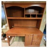 Wood laminate Computer Desk with Hutch. 57" 1/8 W x 23.5" D x 70"H. In the basement, hutch is removable for transport.  Very good condition.