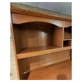 Wood laminate Computer Desk with Hutch. 57" 1/8 W x 23.5" D x 70"H. In the basement, hutch is removable for transport.  Very good condition.