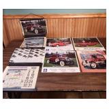 NAPA Auto Parts Classic Car Calendar Collection 1994-1996 - and a plastic hanger with 4 sections of calendars and car photos that have been cut from calendars.