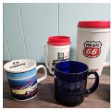 Phillips 66 Promotional Items - coffee mugs, travel mugs, ink pens, shot glass, and a zipper pouch.