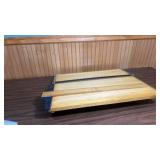 portable drafting board with a parallel straight edge - Wooden board has feet to tilt it, edge moves up and down on board.  Plus on other straight edge