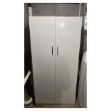 White Metal Storage Cabinet with Black Handles - good condition. Slight finish wear on bottom shelf only.  30" W x 12" D x 62" H