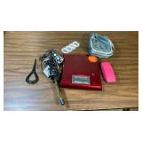 Personal Care lot - Norelco shaver, curling iron, hair pin, shower curtain rings, scale (untested), eyeglasses, and a travel storage bag