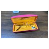 Personal Care lot - Norelco shaver, curling iron, hair pin, shower curtain rings, scale (untested), eyeglasses, and a travel storage bag