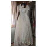 Vintage Long Sleeve Lace Wedding Dress with Pearl Buttons. Satin and tulle layer underneath