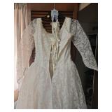 Vintage Long Sleeve Lace Wedding Dress with Pearl Buttons. Satin and tulle layer underneath