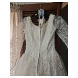 Vintage Long Sleeve Lace Wedding Dress with Pearl Buttons. Satin and tulle layer underneath