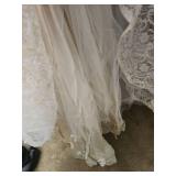 Vintage Long Sleeve Lace Wedding Dress with Pearl Buttons. Satin and tulle layer underneath