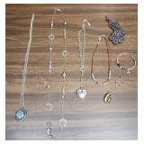 Vintage costume jewelry- 4 necklaces, one bracelet, a pendant, and 2 brooches