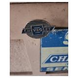 Wood storage Bench with Chevrolet Super Service Metal Sign and Chevrolet Logo Drawer Pull  36.5" W x 22.5"D x 25"H. Has mounted fire extinguisher, shelf/trays inside
