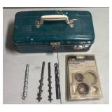 Small toolbox with large bits and hole saw bits