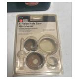 Small toolbox with large bits and hole saw bits