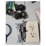 Plumbing, Electrical and general maintenance home improvement lot - including jar of large bolts, lightweight chain, casters, light switches, plumbing attachments and more