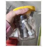 Plumbing, Electrical and general maintenance home improvement lot - including jar of large bolts, lightweight chain, casters, light switches, plumbing attachments and more