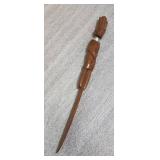 Wood carved knives - one is of an Egyptian the other says Walker State Park