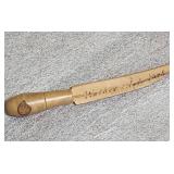 Wood carved knives - one is of an Egyptian the other says Walker State Park