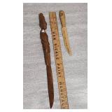 Wood carved knives - one is of an Egyptian the other says Walker State Park