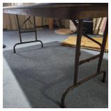 6 foot wood laminate top folding table - measures 72" L x 29.75" W x 29.25" H - has surface scratches and wear but very sturdy