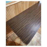 6 foot wood laminate top folding table - measures 72" L x 29.75" W x 29.25" H - has surface scratches and wear but very sturdy
