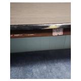 5 foot wood laminate top folding table - measures 60" W x 30" W x 29" H - has some paint splatters on it, but otherwise edges are in good condition and it is sturdy