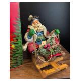 Possible Dreams Santa on Wooden Sled