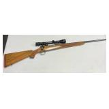 Winchester pre-64 .300 bolt action rifle with Redfield scope