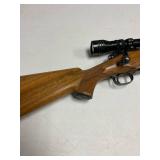 Winchester pre-64 .300 bolt action rifle with Redfield scope